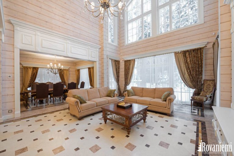 Living room inside Helios wooden house cottage by Rovaniemi Log House.