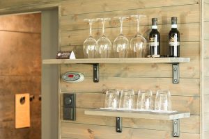 Arctic Glass House's details – glasses and sauna switch.